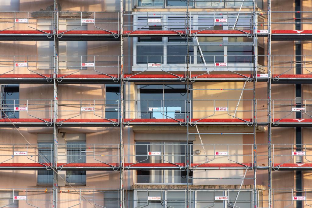 Scaffolding covering the facade of an urban building